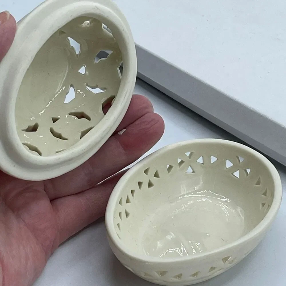 Vintage Cream Lusterware floral cut out design Easter Egg trinket box.